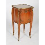 An early 20th century French oak and gilt bronze mounted marble topped bedside table in the manner