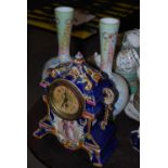 Late 19th century Majolica style porcelain mantel clock, the case of architectural form with C-