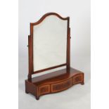 Late 19th/ early 20th century mahogany dressing table mirror, of serpentine rectangular form with