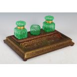 Late 19th century Boulle desk stand, set with two green tinted glass inkwells with gilt metal