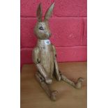 Articulated wooden rabbit figure