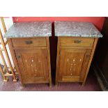 Pair of inlaid oak and marble top bedside cabinets