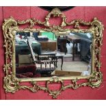 Ornate metal gilt framed mirror