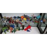 Collection of action figures to include Incredible Hulk, He-Man & boxed Star Wars over 2 shelves