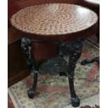 Heavy base cast iron pub table with 300 uncirculated 1967 pennies under resin on top