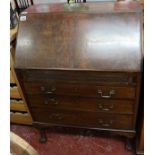 Mahogany bureau on ball and claw feet