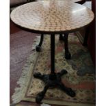 Cast iron base pub table with 300 uncirculated 1967 pennies under resin on top