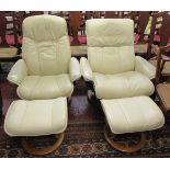 2 Stressless leather reclining armchairs with footstools