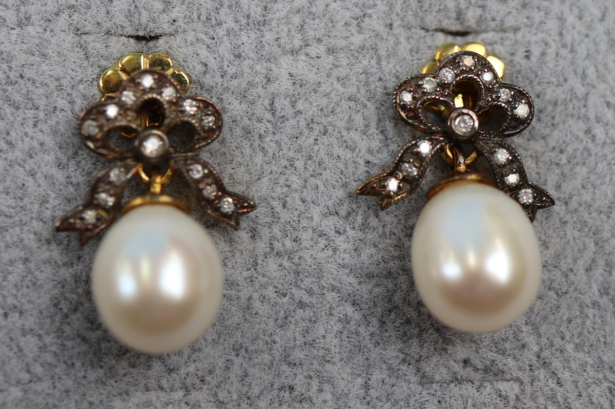 Pair of pearl & diamond bow earrings