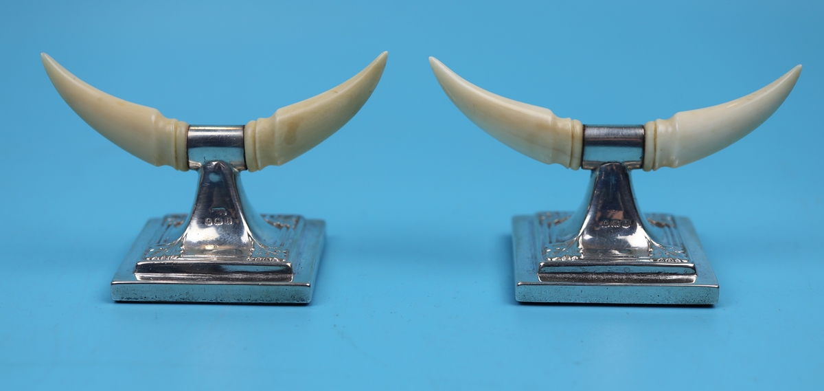 Pair of hallmarked silver and ivory knife stands