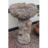 Stone plant stand adorned wit cherubs - Approx H: 81cm