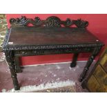 Carved oak hall table