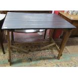 Folding trestle table