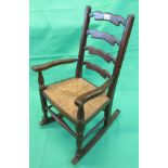 Small oak framed child's rocking chair