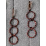 Pair of triple loop diamond & red stone earrings