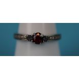 White gold ruby set ring