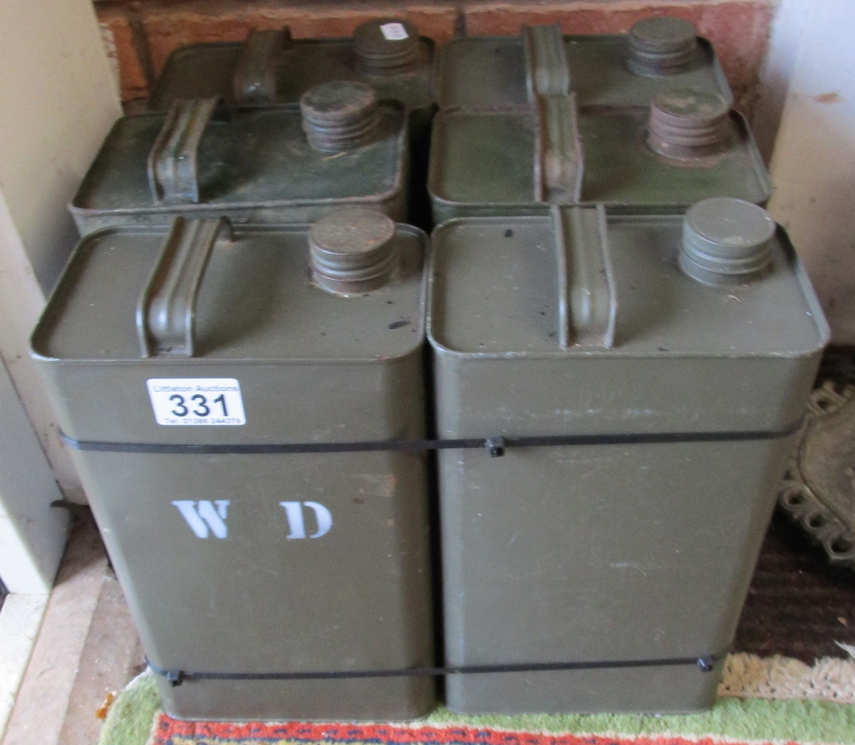 Six military style oil cans