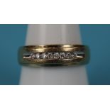 Gold channel set diamond ring