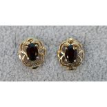 Pair of gold garnet earrings
