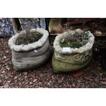 2 stone sack planters signed Helen Young