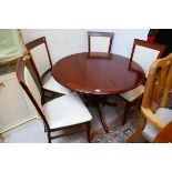 Extending dining table and 4 chairs