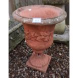 Terracotta planter on stand