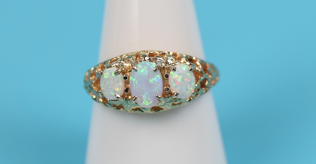 Gold opal 3 stone ring