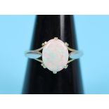 Large opal hallmarked 18 carat gold ring