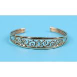 Gold blue topaz set bangle