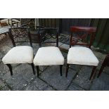 Pair of chairs and another