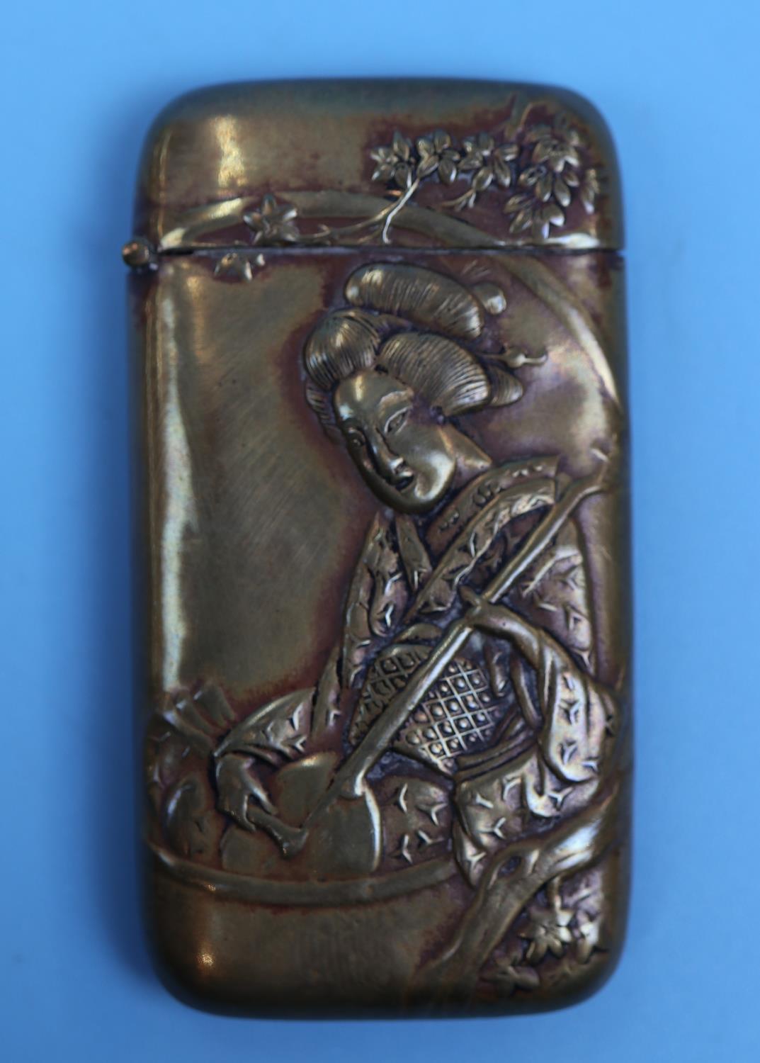 A brass novelty vesta case embossed with the figure of a Japanese Geisha and bamboo on the other - Image 2 of 5