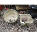 2 stone planters