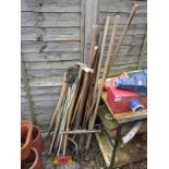 Collection of garden tools to include drain rods