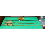3 vintage fishing rods to include cane examples