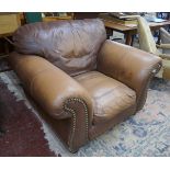 Large & very comfortable brown leather armchair