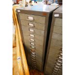 Bank of metal index drawers