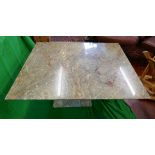 Marble coffee table on plinth