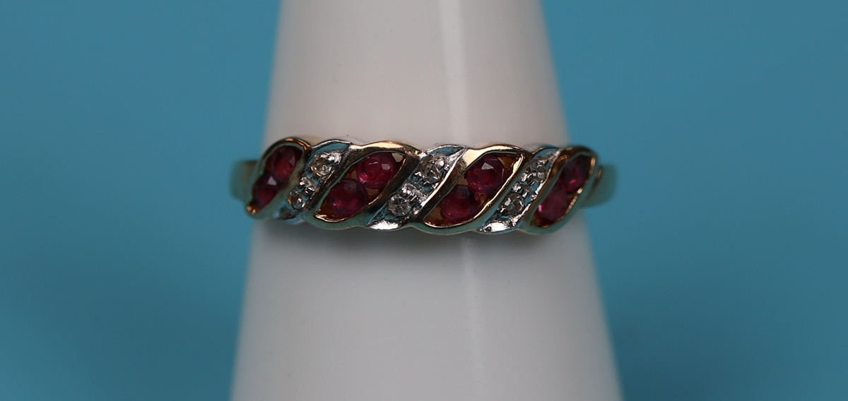 Gold ruby & diamond set ring