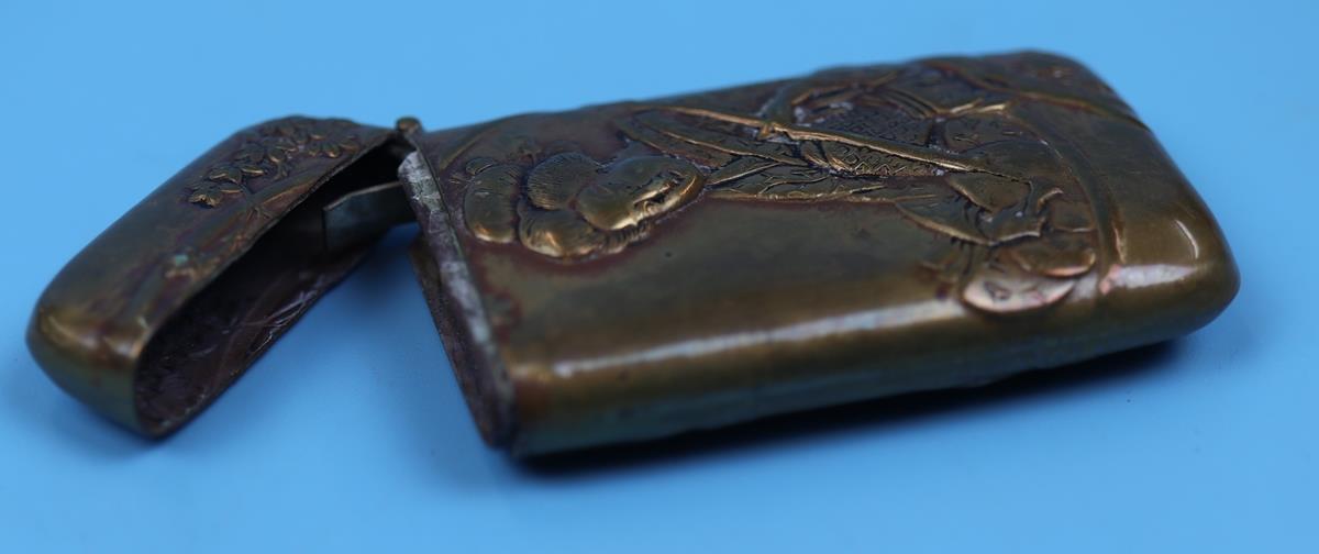 A brass novelty vesta case embossed with the figure of a Japanese Geisha and bamboo on the other - Image 4 of 5