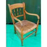 Beech rush seated spindle back armchair