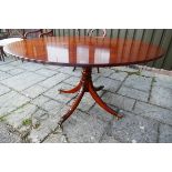 Oval mahogany pedestal dining table by Archer and Smith
