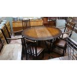 Barley twist gateleg oak table and 6 chairs to include 2 carvers