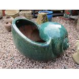 Terracotta and glazed snail planter