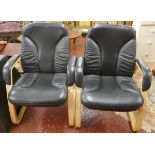 Pair of contemporary leather chairs