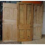 3 stripped pine doors