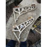 Pair of cast iron brackets