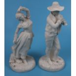 Pair of late Victorian Parian ware figurines dressed in 18th C attire