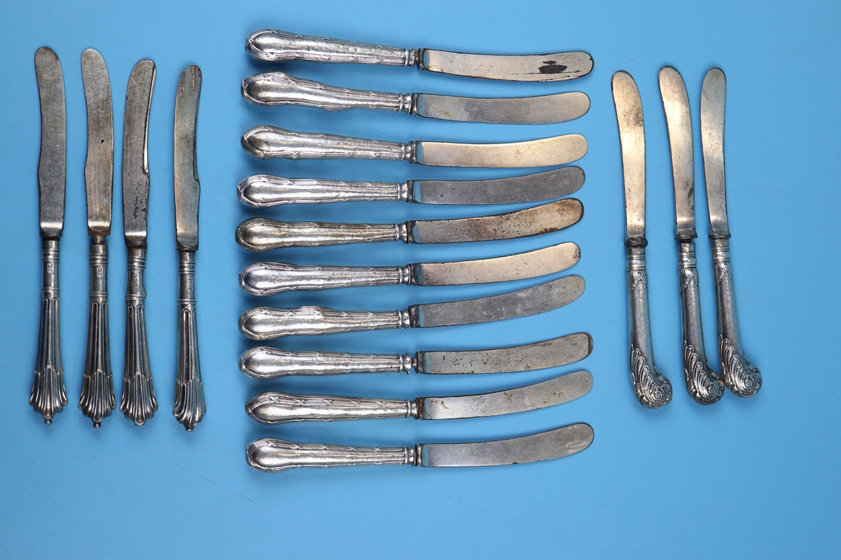 17 silver handled knives