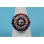 Platinum diamond & ruby target ring