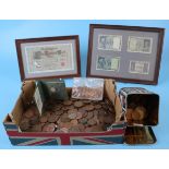 Box of coins and framed bank notes
